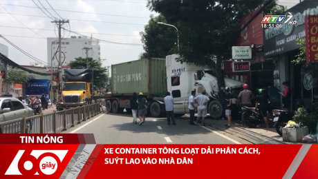 Xem Clip XE CONTAINER TÔNG LOẠT DẢI PHÂN CÁCH, SUÝT LAO VÀO NHÀ DÂN HD Online.