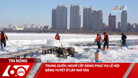 TRUNG QUỐC: NGHỀ CẮT BĂNG PHỤC VỤ LỄ HỘI BĂNG TUYẾT Ở CÁP NHĨ TÂN