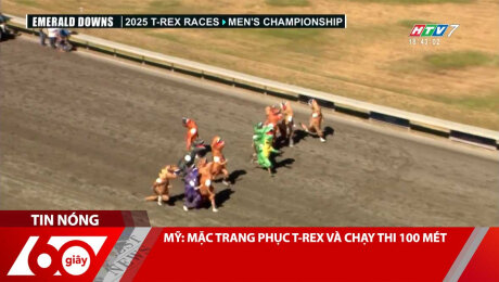 MỸ: MẶC TRANG PHỤC T-REX VÀ CHẠY THI 100 MÉT